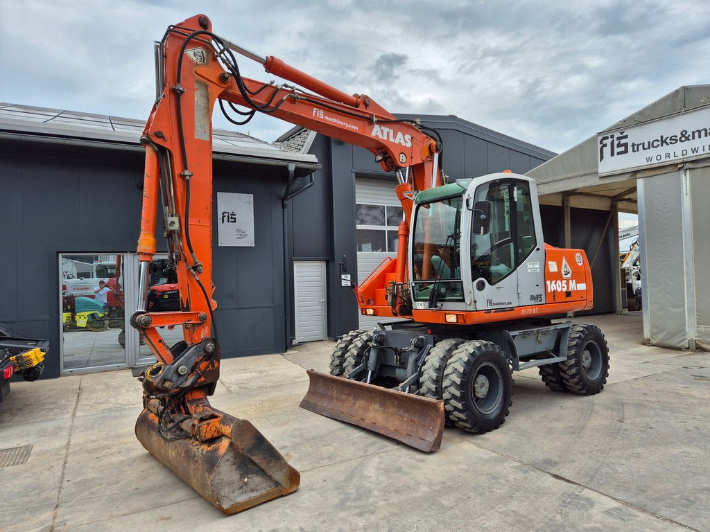 Atlas 1605 - 2005 Year - 2X Buckets - Pelle sur pneus: photos 1 Atlas 1605 - 2005 Year - 2X Buckets - Pelle sur pneus: photos 1