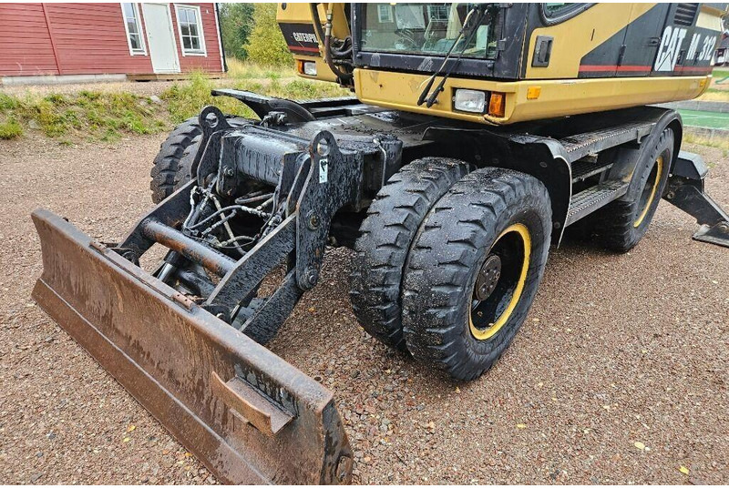 Caterpillar M312 Engcon EC20 tiltrotator - Pelle sur pneus: photos 4 Caterpillar M312 Engcon EC20 tiltrotator - Pelle sur pneus: photos 4