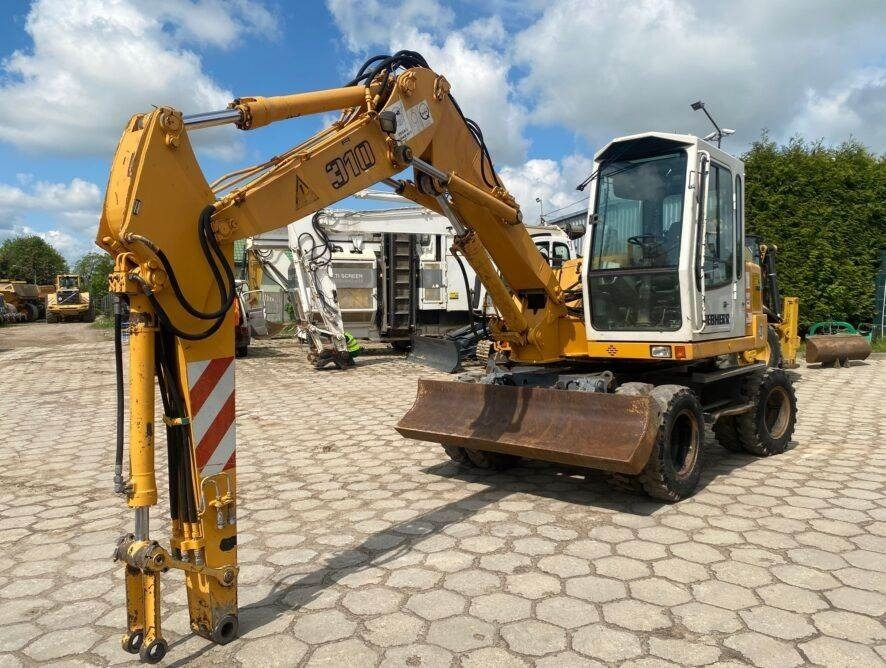 Liebherr A310B - Pelle sur pneus: photos 4 Liebherr A310B - Pelle sur pneus: photos 4