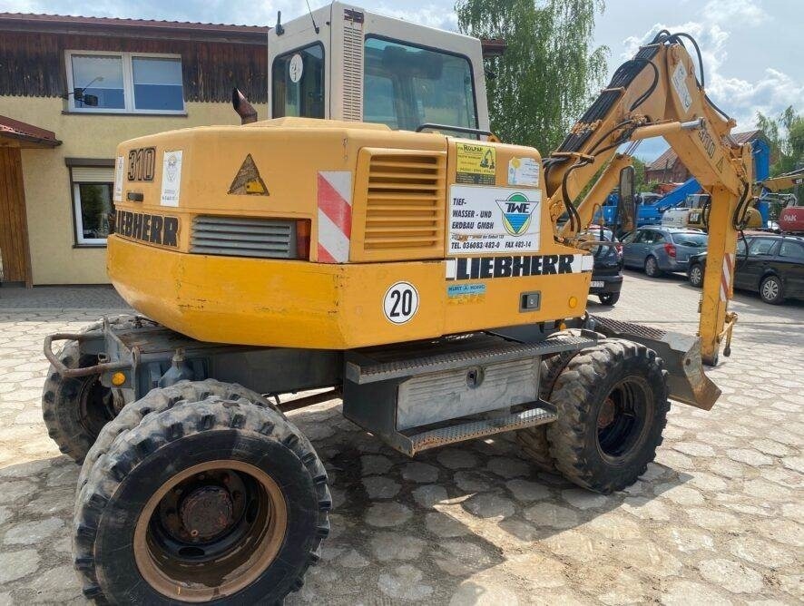 Liebherr A310B - Pelle sur pneus: photos 3 Liebherr A310B - Pelle sur pneus: photos 3