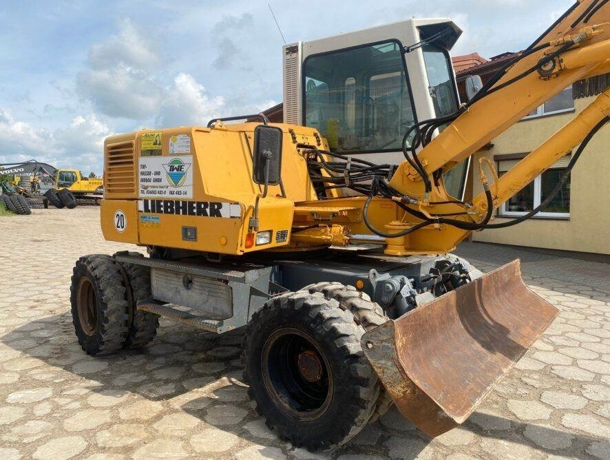 Liebherr A310B - Pelle sur pneus: photos 5 Liebherr A310B - Pelle sur pneus: photos 5