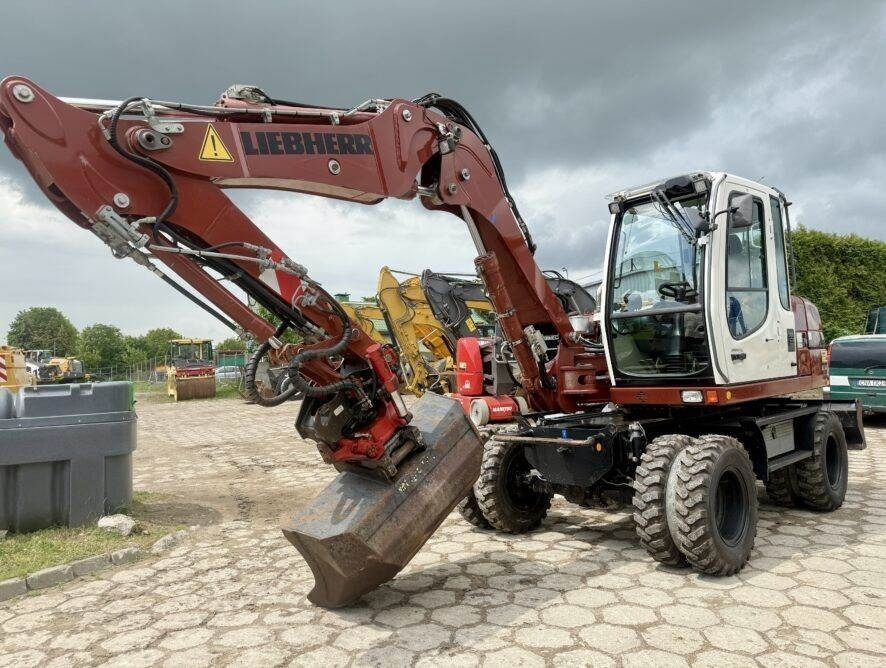 Liebherr A311 Litronic - Pelle sur pneus: photos 4 Liebherr A311 Litronic - Pelle sur pneus: photos 4