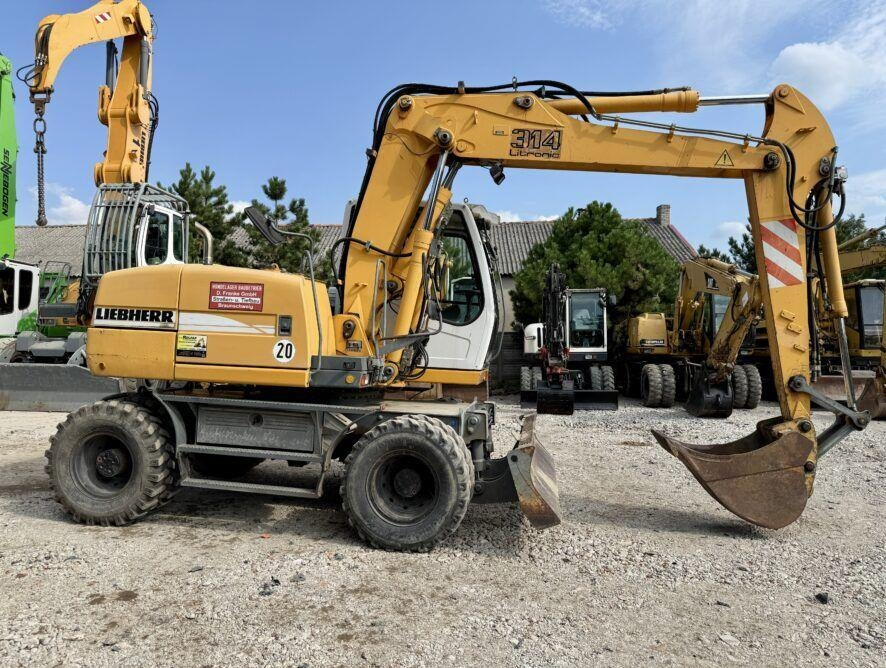 Liebherr A314 - Pelle sur pneus: photos 4 Liebherr A314 - Pelle sur pneus: photos 4