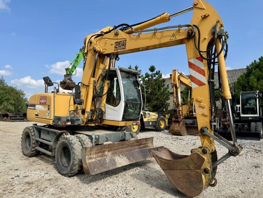 Liebherr A314 - Pelle sur pneus: photos 5 Liebherr A314 - Pelle sur pneus: photos 5