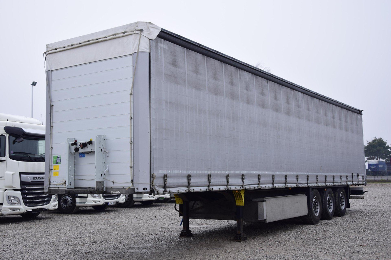Schmitz Cargobull SCS24/L Lifting Axle - Semi-remorque rideaux coulissants: photos 1 Schmitz Cargobull SCS24/L Lifting Axle - Semi-remorque rideaux coulissants: photos 1