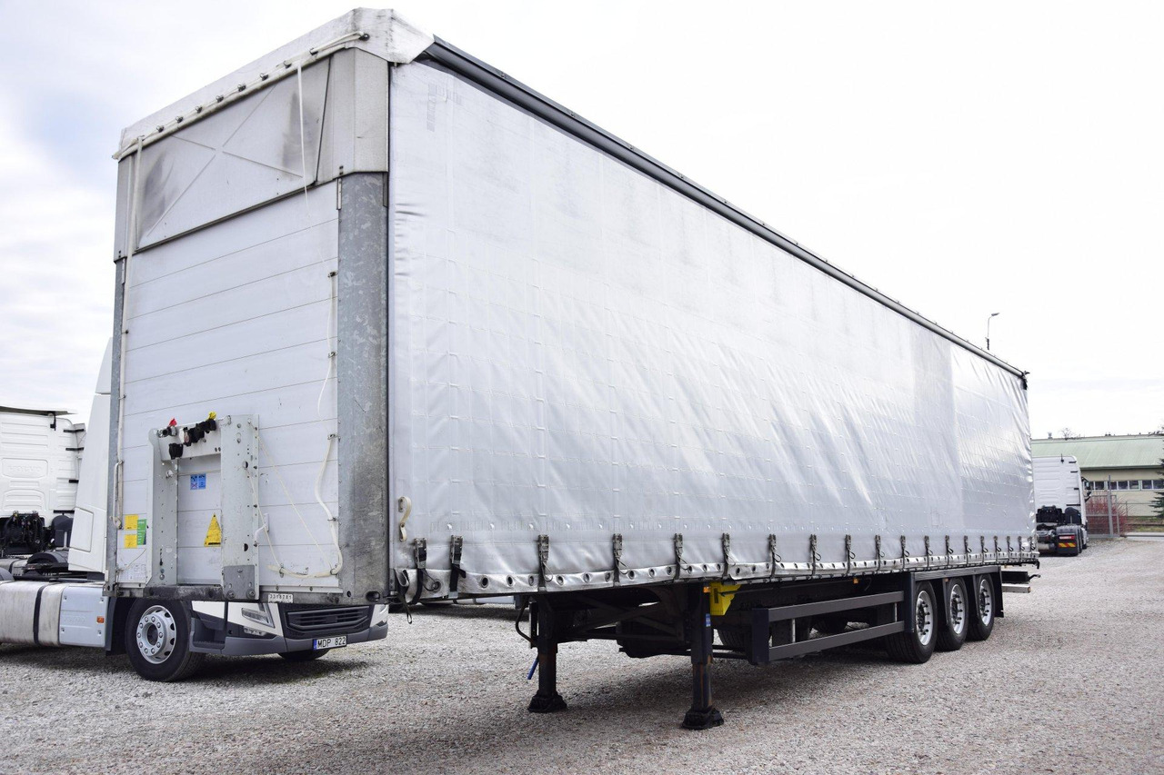 Schmitz Cargobull SCS24/L Varios - Semi-remorque rideaux coulissants: photos 1 Schmitz Cargobull SCS24/L Varios - Semi-remorque rideaux coulissants: photos 1