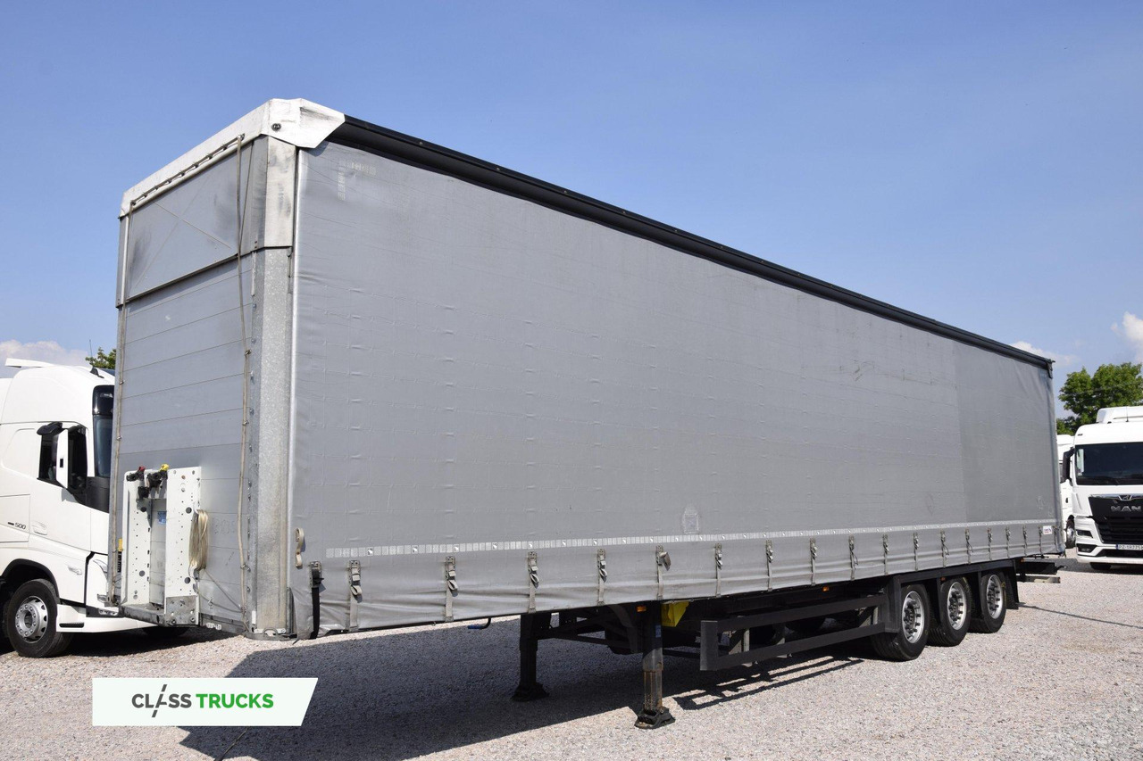 Schmitz Cargobull SCS24/L Varios - Semi-remorque rideaux coulissants: photos 1 Schmitz Cargobull SCS24/L Varios - Semi-remorque rideaux coulissants: photos 1