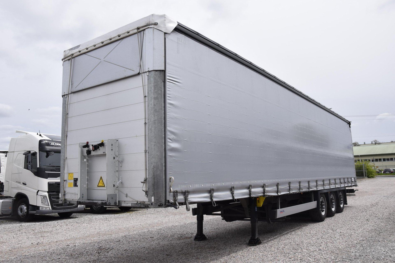 Schmitz Cargobull SCS24/L Varios - Semi-remorque rideaux coulissants: photos 1 Schmitz Cargobull SCS24/L Varios - Semi-remorque rideaux coulissants: photos 1