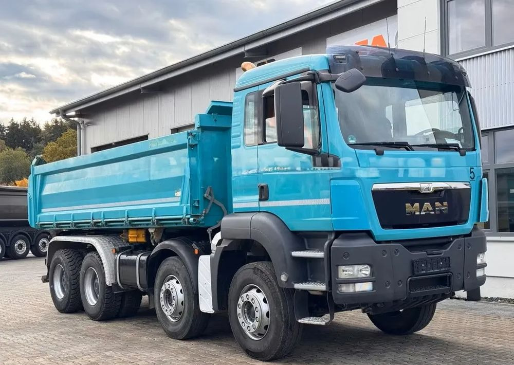 MAN TGS 35.440 / Meiller 3-stronny wywrotka / Bordmatik / 8x4 / Euro5 - Camion benne: photos 1 MAN TGS 35.440 / Meiller 3-stronny wywrotka / Bordmatik / 8x4 / Euro5 - Camion benne: photos 1