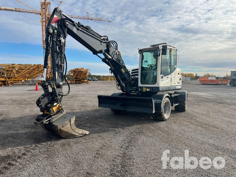 Terex TW85 - Pelle sur pneus: photos 1 Terex TW85 - Pelle sur pneus: photos 1