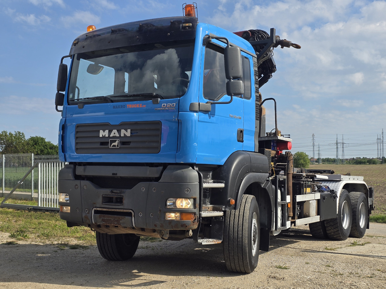 MAN TGA 33.430 6X6 / HMF 1823 K3+REM.CON./ HOOK SYSTEM - Camion ampliroll, Camion grue: photos 2 MAN TGA 33.430 6X6 / HMF 1823 K3+REM.CON./ HOOK SYSTEM - Camion ampliroll, Camion grue: photos 2