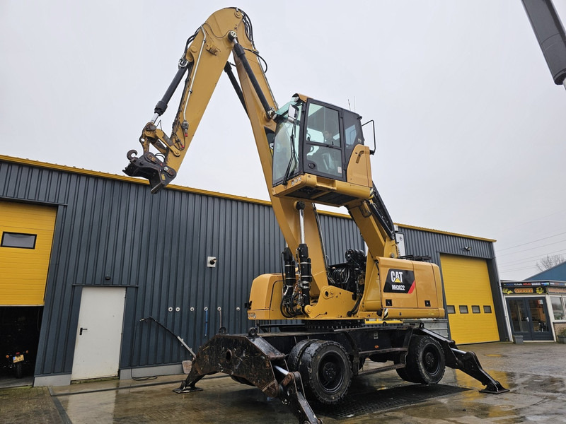 Caterpillar MH 3022 - Pelle de manutention: photos 1 Caterpillar MH 3022 - Pelle de manutention: photos 1