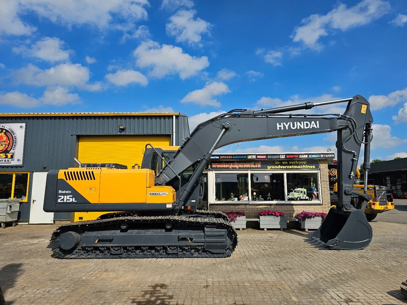 Hyundai R215L - Pelle sur chenille: photos 5 Hyundai R215L - Pelle sur chenille: photos 5