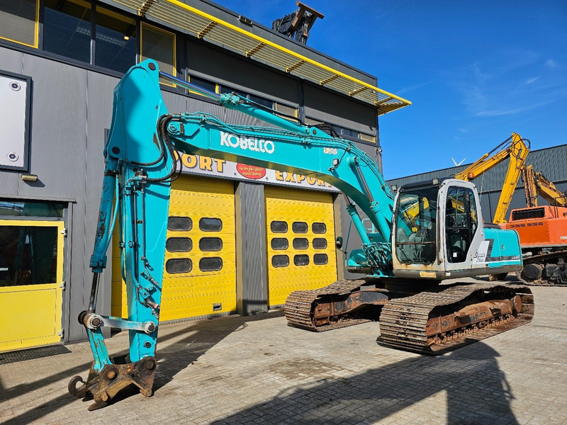 Kobelco SK210LC-6 - Pelle sur chenille: photos 2 Kobelco SK210LC-6 - Pelle sur chenille: photos 2