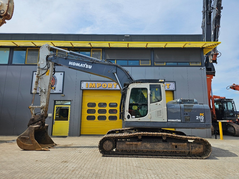 Komatsu PC210LC-8 - Pelle sur chenille: photos 1 Komatsu PC210LC-8 - Pelle sur chenille: photos 1