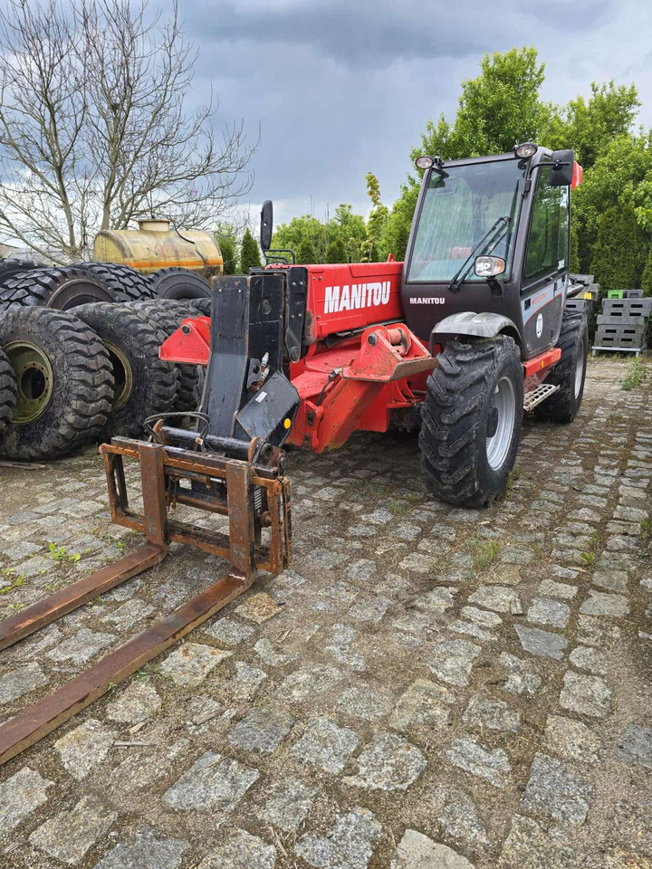 MANITOU ST 1235 - Chargeuse sur pneus télescopique: photos 1 MANITOU ST 1235 - Chargeuse sur pneus télescopique: photos 1