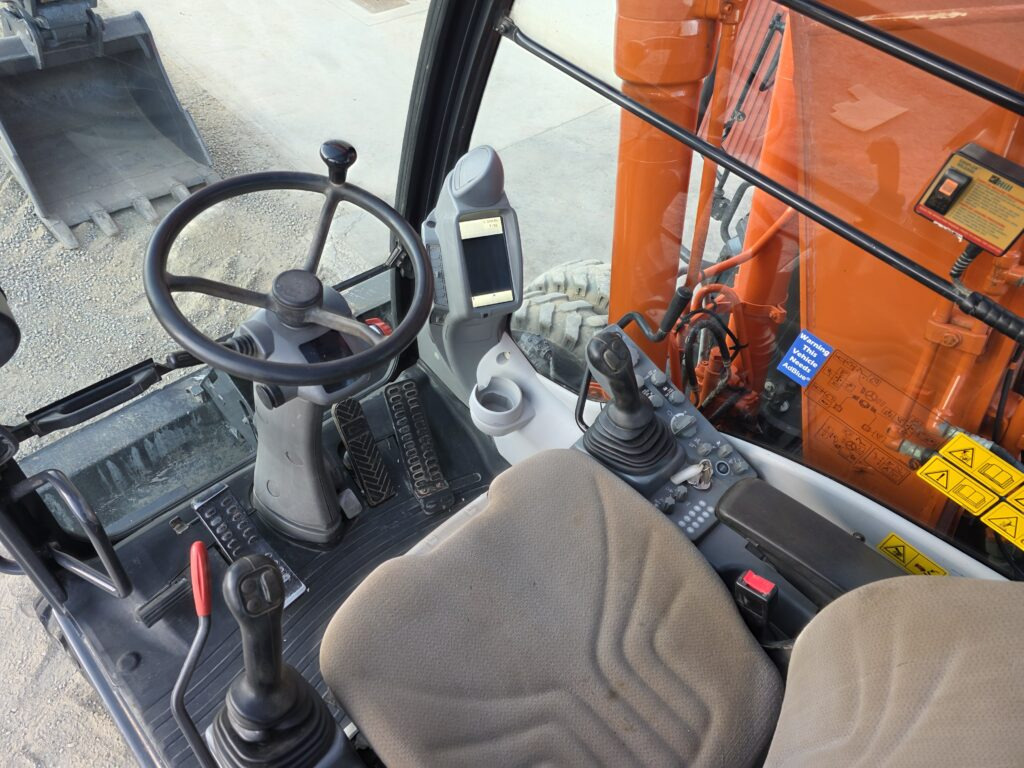 Pelle sur pneus HITACHI ZX140W-6: photos 7