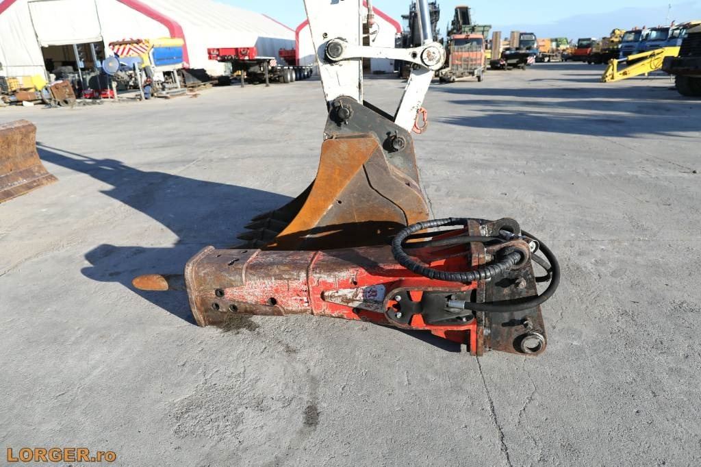Pelle sur pneus New Holland MH 6.6 + Sandvic Hammer: photos 20