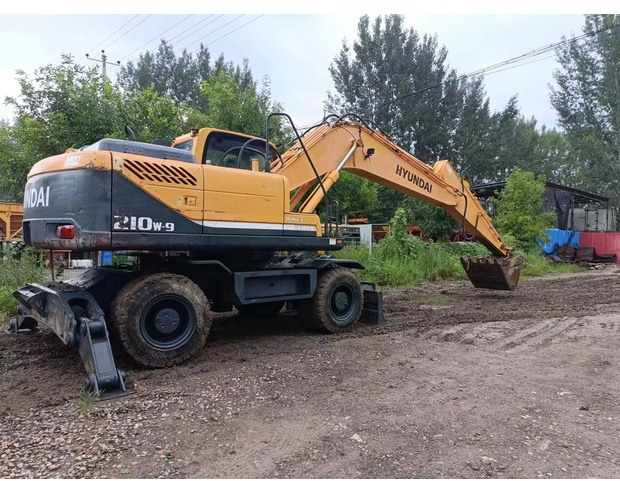 2022 Hyundai 210W-9 - Pelle sur pneus: photos 1 2022 Hyundai 210W-9 - Pelle sur pneus: photos 1
