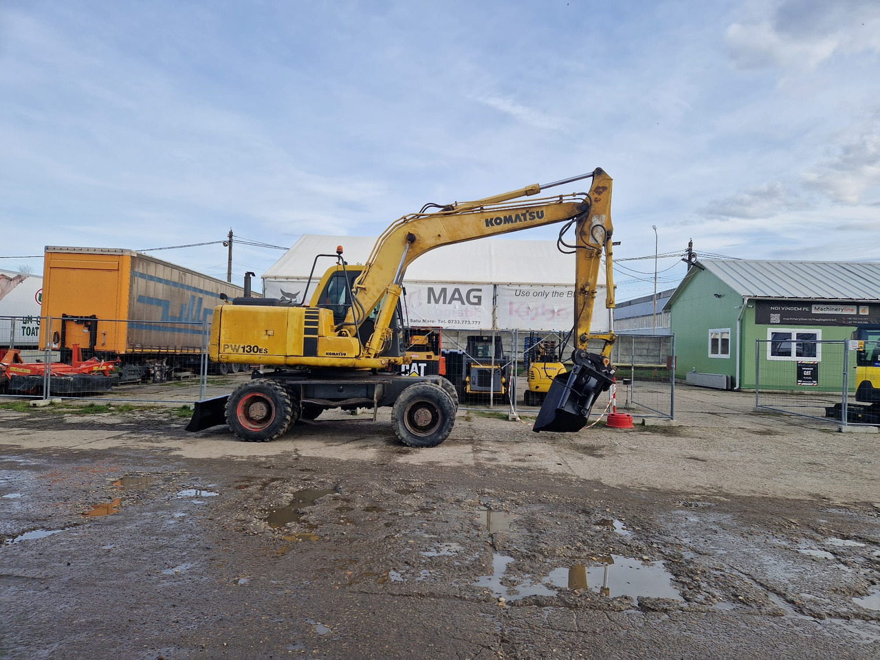 KOMATSU PW130 ES-6K - Pelle sur pneus: photos 4 KOMATSU PW130 ES-6K - Pelle sur pneus: photos 4
