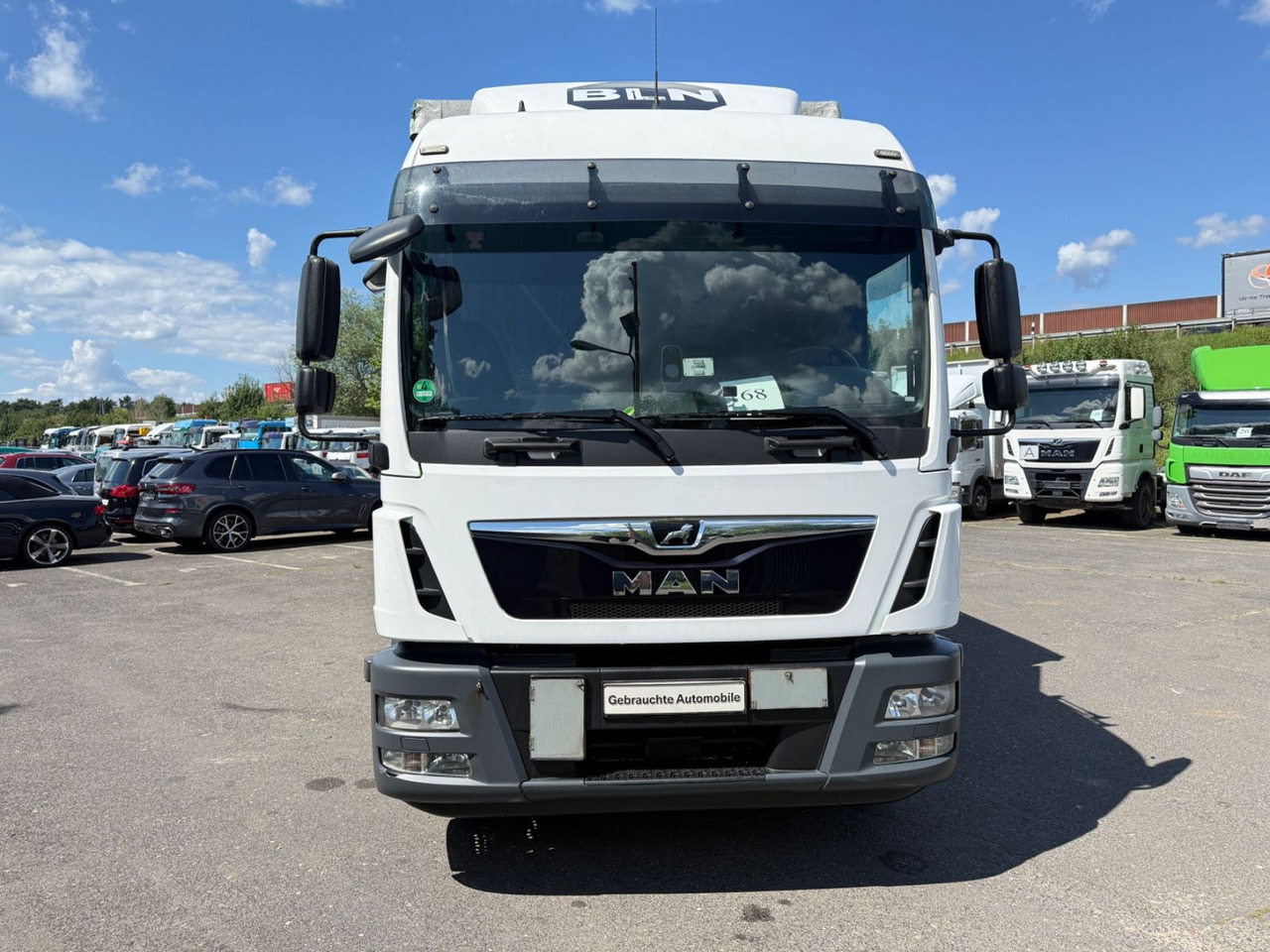 MAN TGM 15.290 - Camion à rideaux coulissants: photos 1 MAN TGM 15.290 - Camion à rideaux coulissants: photos 1