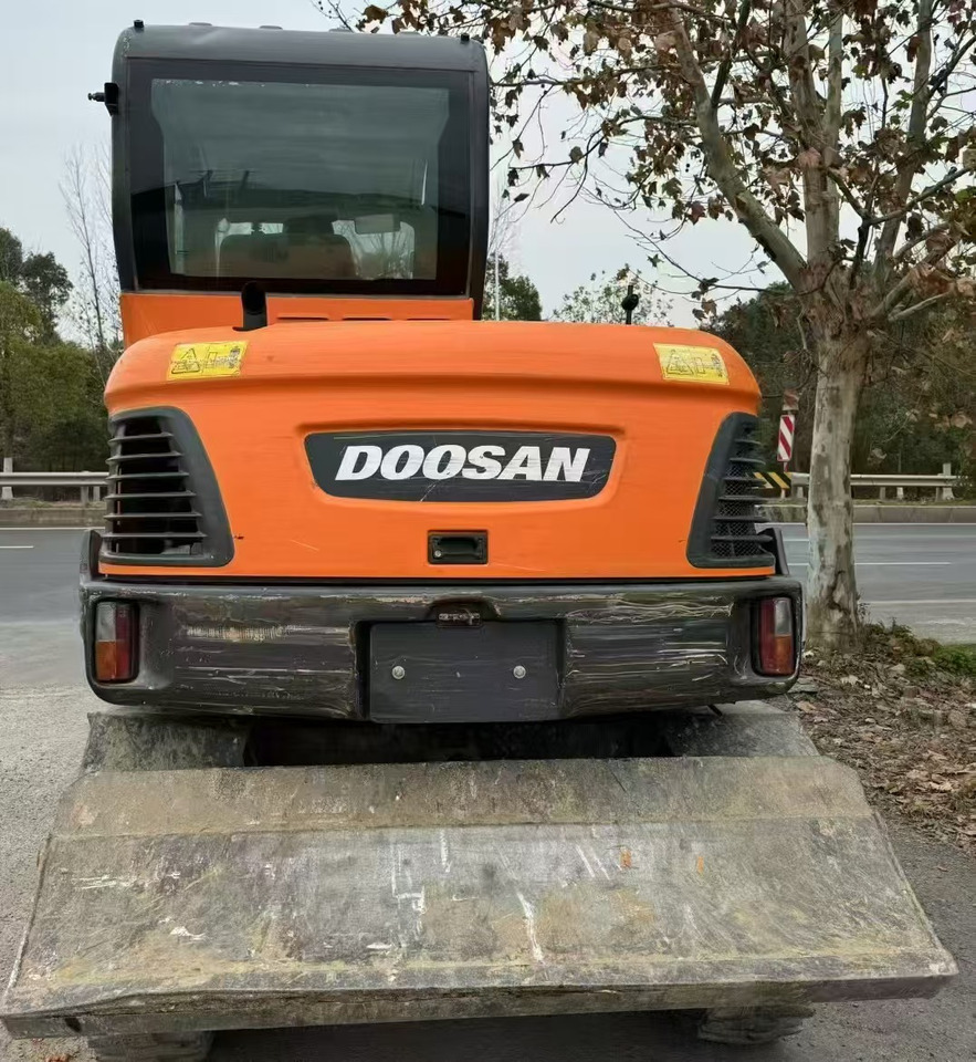Doosan DX60 - Pelle sur pneus: photos 5 Doosan DX60 - Pelle sur pneus: photos 5