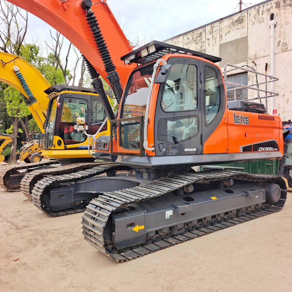 Doosan DX 300 - Pelle sur chenille: photos 1 Doosan DX 300 - Pelle sur chenille: photos 1