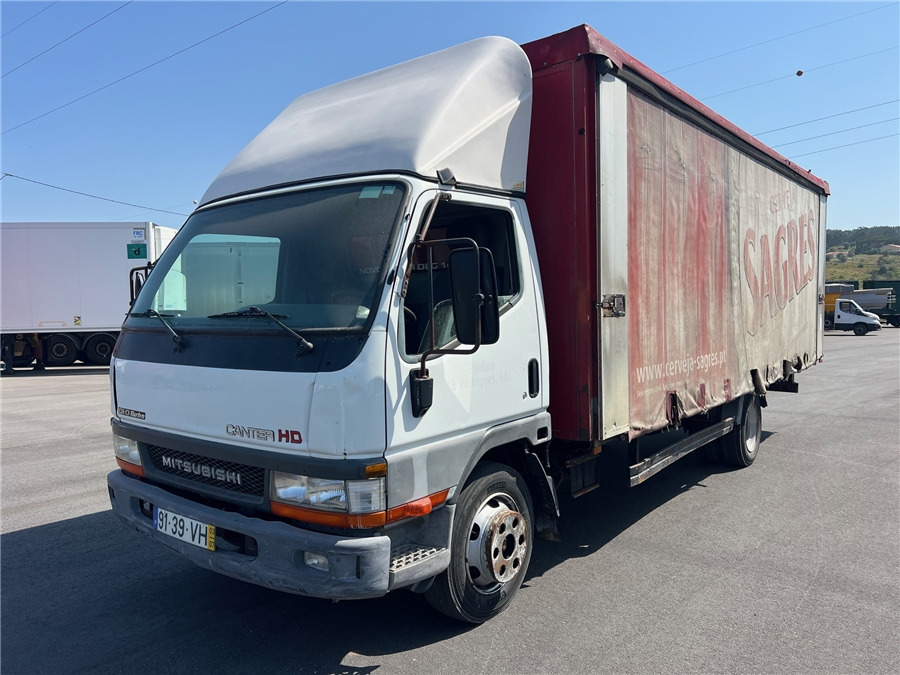 Mitsubishi FE659 - Camion à rideaux coulissants: photos 1 Mitsubishi FE659 - Camion à rideaux coulissants: photos 1
