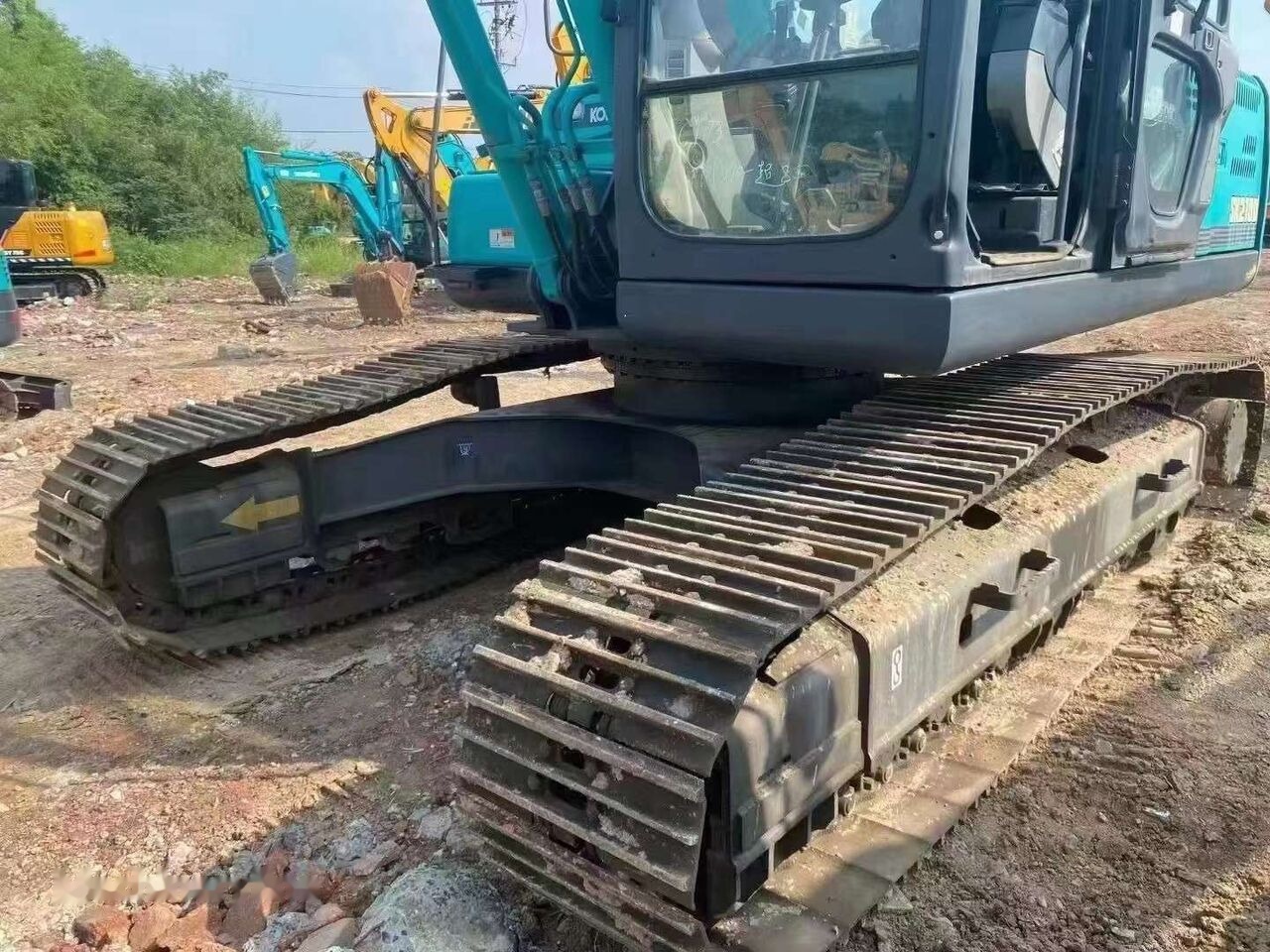 Kobelco SK210D - Pelle sur chenille: photos 4 Kobelco SK210D - Pelle sur chenille: photos 4