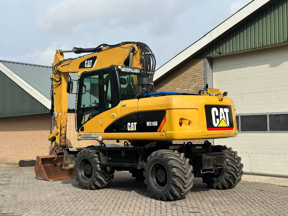 Caterpillar M316D - Pelle sur pneus: photos 2 Caterpillar M316D - Pelle sur pneus: photos 2