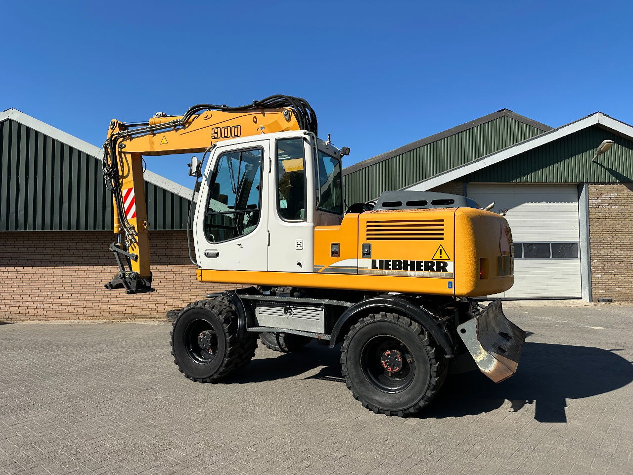 Liebherr A900C - Pelle sur pneus: photos 2 Liebherr A900C - Pelle sur pneus: photos 2