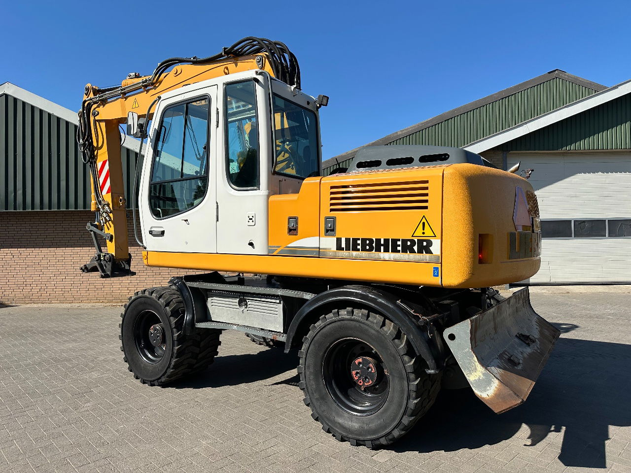 Liebherr A900C - Pelle sur pneus: photos 3 Liebherr A900C - Pelle sur pneus: photos 3
