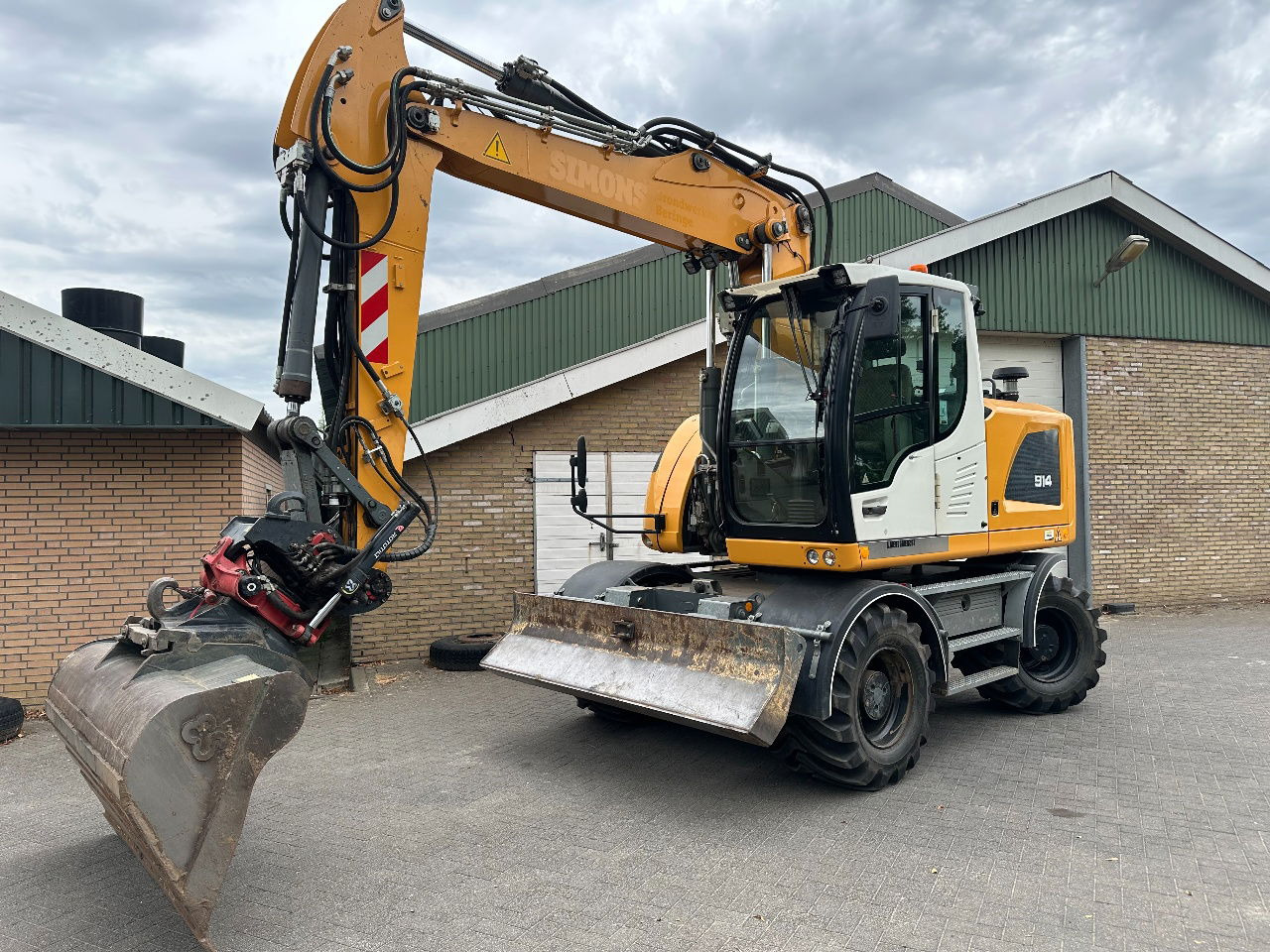 Liebherr A914 - Pelle sur pneus: photos 1 Liebherr A914 - Pelle sur pneus: photos 1
