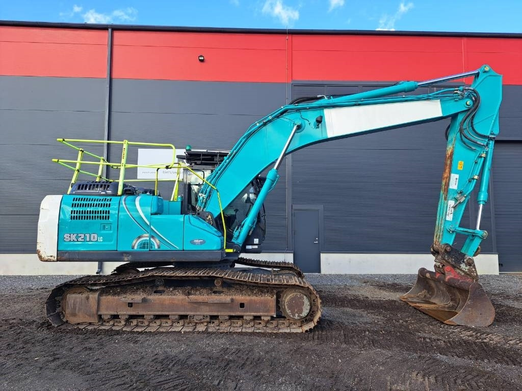 Kobelco SK 210 LC-10E - Pelle sur chenille: photos 5 Kobelco SK 210 LC-10E - Pelle sur chenille: photos 5