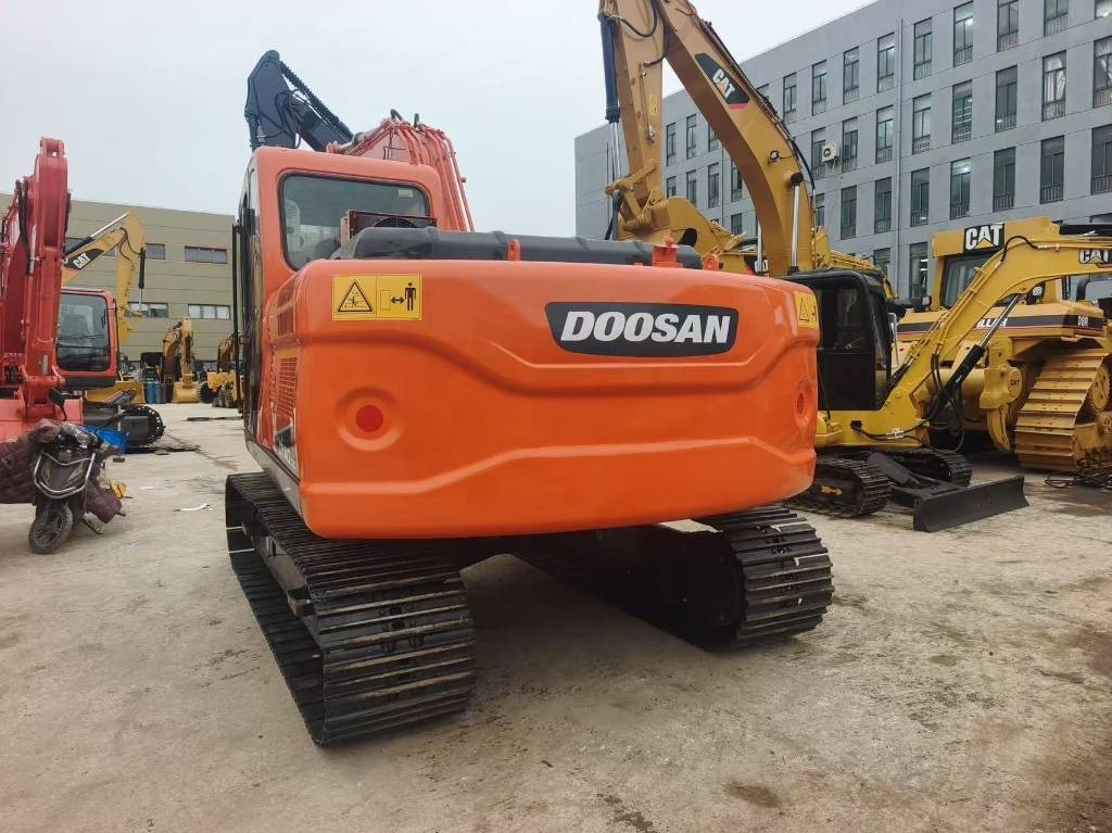 Doosan DX 140 - Pelle sur chenille: photos 5 Doosan DX 140 - Pelle sur chenille: photos 5