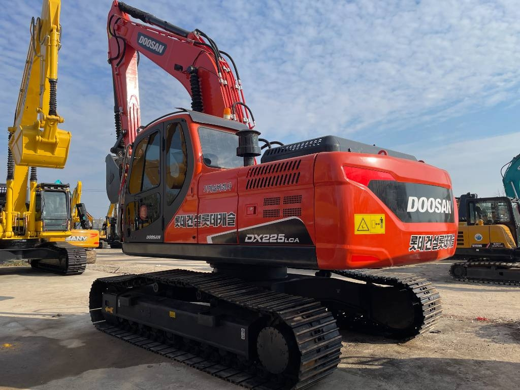 Doosan DX225LCA - Pelle sur chenille: photos 1 Doosan DX225LCA - Pelle sur chenille: photos 1