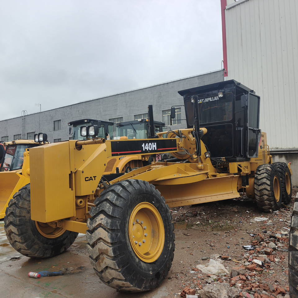 CATERPILLAR 140H Motor Grader - Niveleuse: photos 1 CATERPILLAR 140H Motor Grader - Niveleuse: photos 1