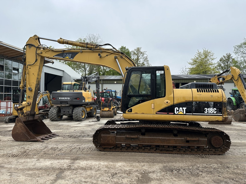 Caterpillar 318 CL Good undercarriage (not 320CL - 325CL) - Pelle sur chenille: photos 3 Caterpillar 318 CL Good undercarriage (not 320CL - 325CL) - Pelle sur chenille: photos 3