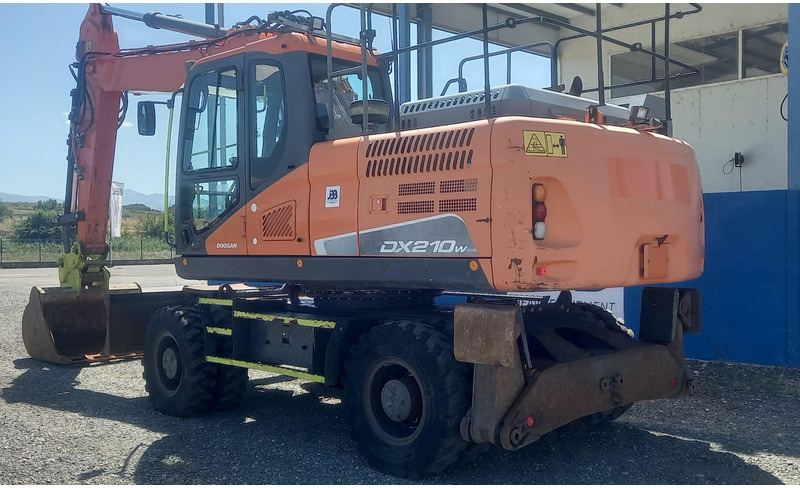 Doosan DX210W-5 - Pelle sur pneus: photos 3 Doosan DX210W-5 - Pelle sur pneus: photos 3
