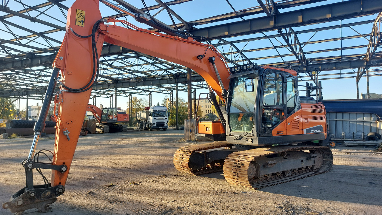DOOSAN DX140LC-5 - Pelle sur chenille: photos 1 DOOSAN DX140LC-5 - Pelle sur chenille: photos 1