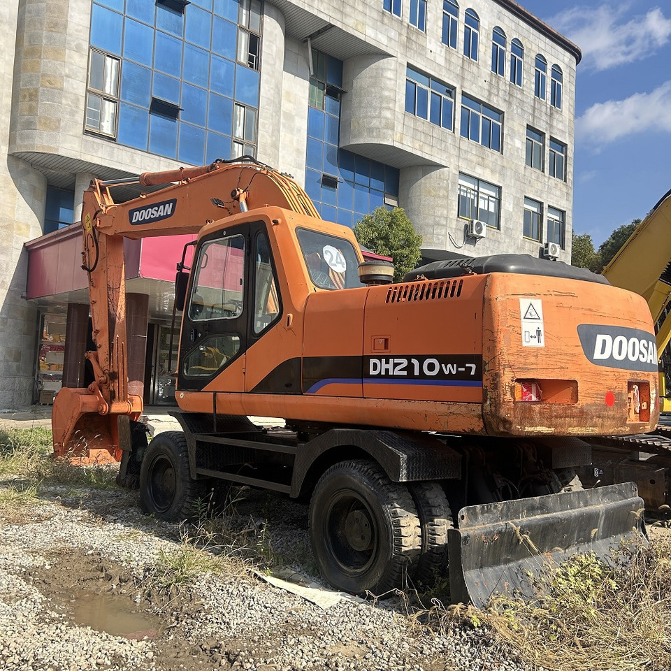 Doosan DH210w-7 wheel excavator - Pelle sur pneus: photos 5 Doosan DH210w-7 wheel excavator - Pelle sur pneus: photos 5
