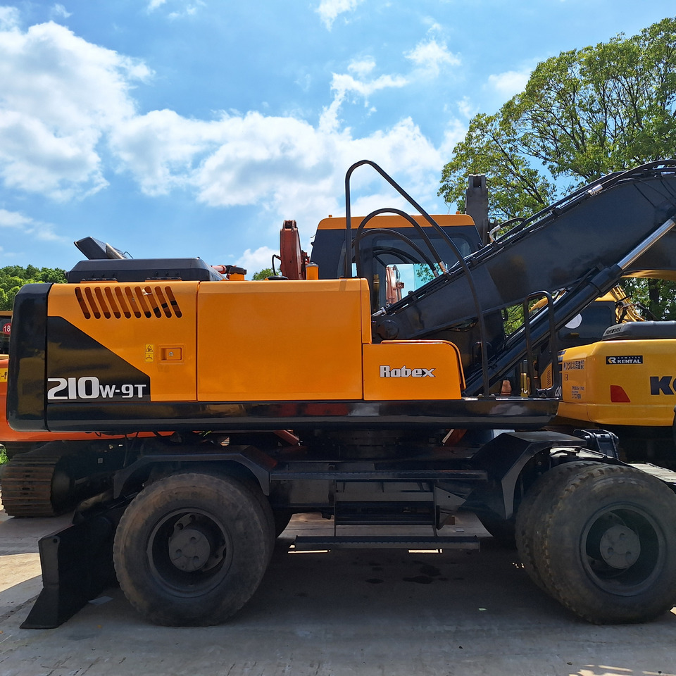 Hyundai 210w-9 wheel excavator - Pelle sur pneus: photos 4 Hyundai 210w-9 wheel excavator - Pelle sur pneus: photos 4