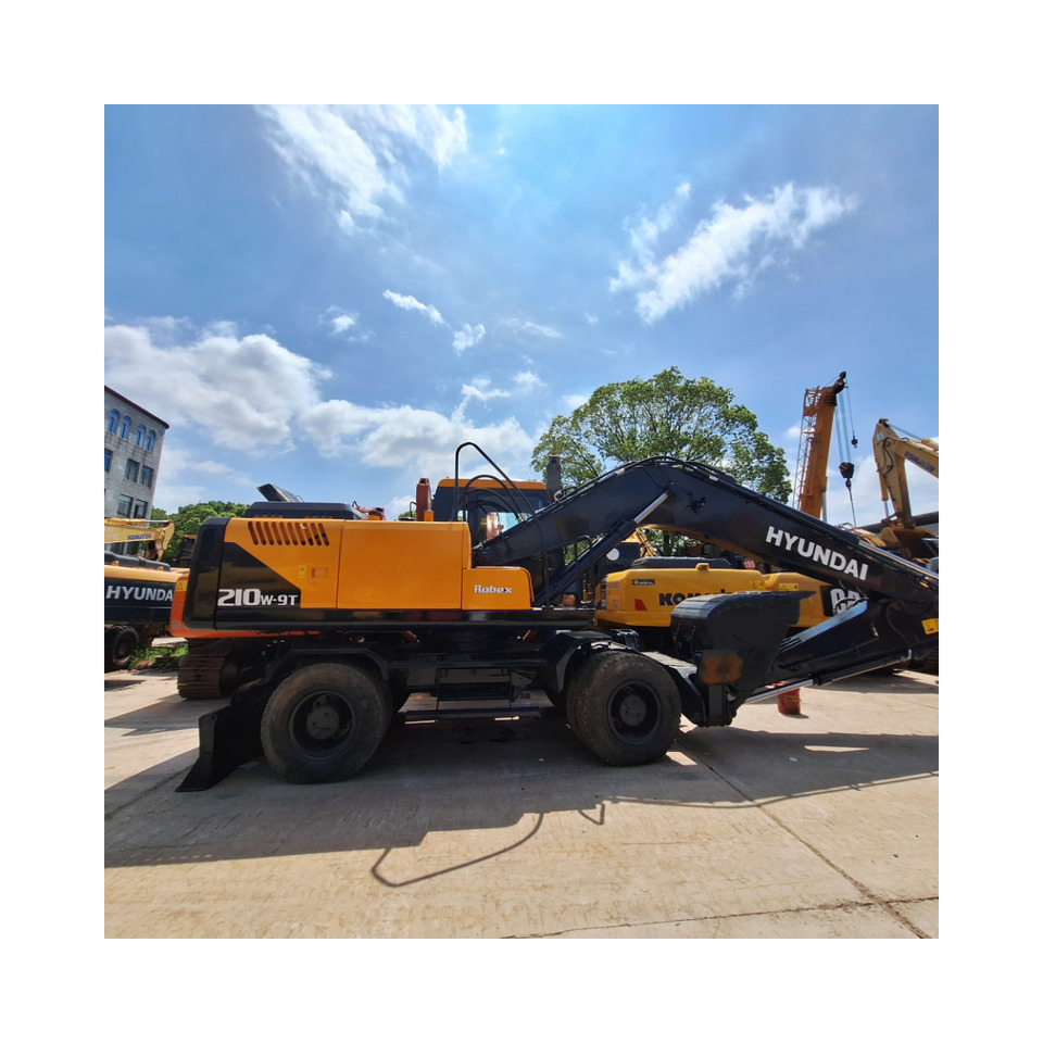 Hyundai 210w-9T wheel excavator - Pelle sur pneus: photos 2 Hyundai 210w-9T wheel excavator - Pelle sur pneus: photos 2