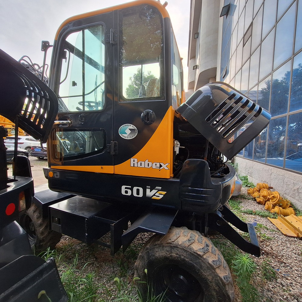 Hyundai 60vs excavator - Pelle sur pneus: photos 1 Hyundai 60vs excavator - Pelle sur pneus: photos 1