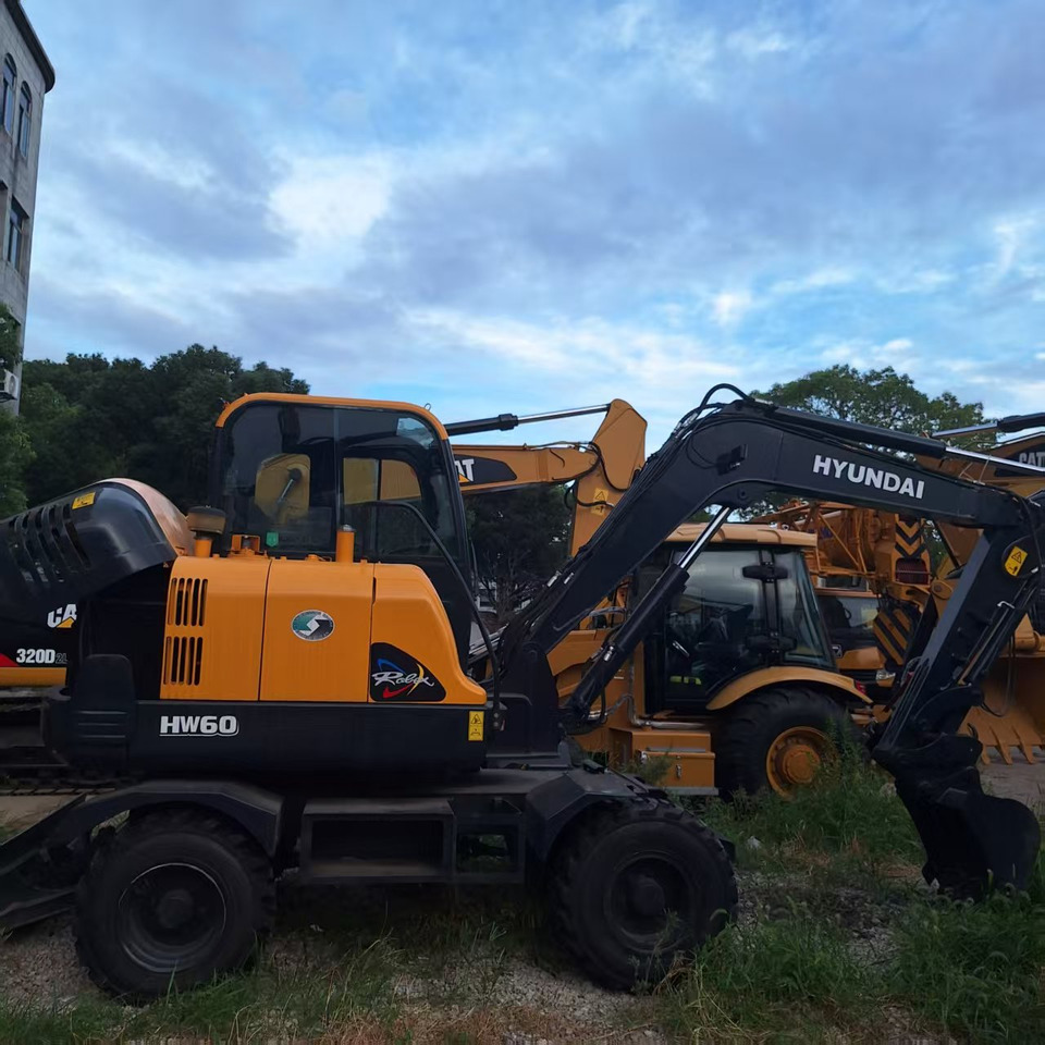 Hyundai HW60 excavator - Pelle sur pneus: photos 5 Hyundai HW60 excavator - Pelle sur pneus: photos 5