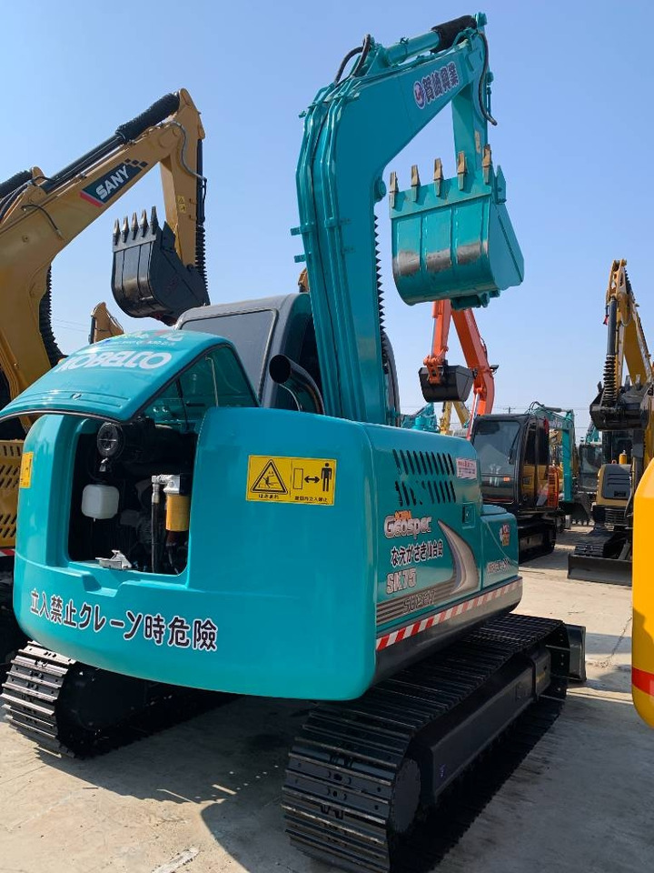 Kobelco SK 75 - Pelle sur chenille: photos 1 Kobelco SK 75 - Pelle sur chenille: photos 1
