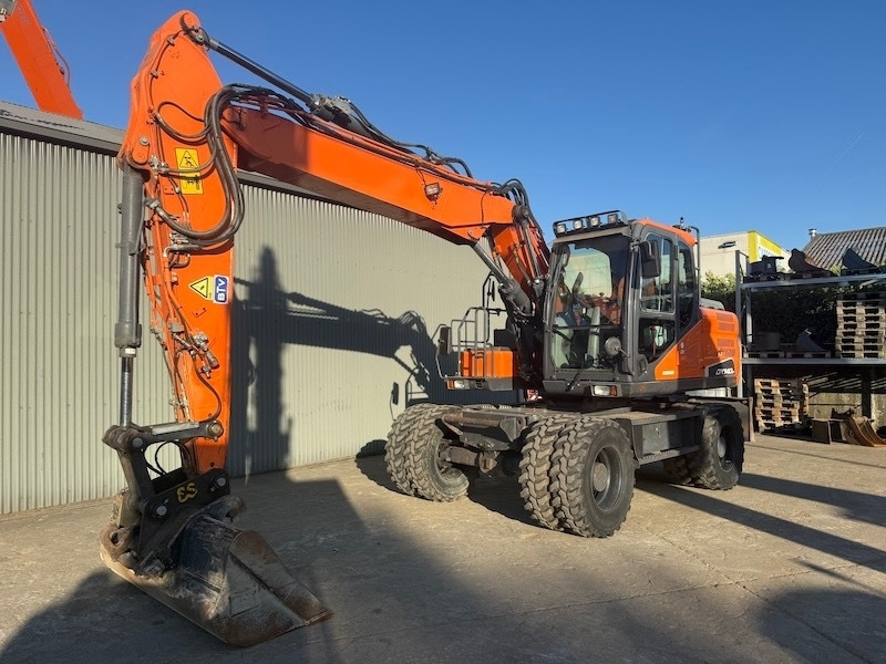 Doosan DX 140 W-5 - Pelle sur pneus: photos 5 Doosan DX 140 W-5 - Pelle sur pneus: photos 5