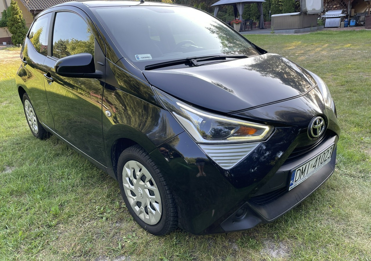 Toyota Aygo II Toyota Aygo 1.0-16V Klima Salon PL 24651km Model 2021 - Voiture à hayon: photos 1 Toyota Aygo II Toyota Aygo 1.0-16V Klima Salon PL 24651km Model 2021 - Voiture à hayon: photos 1