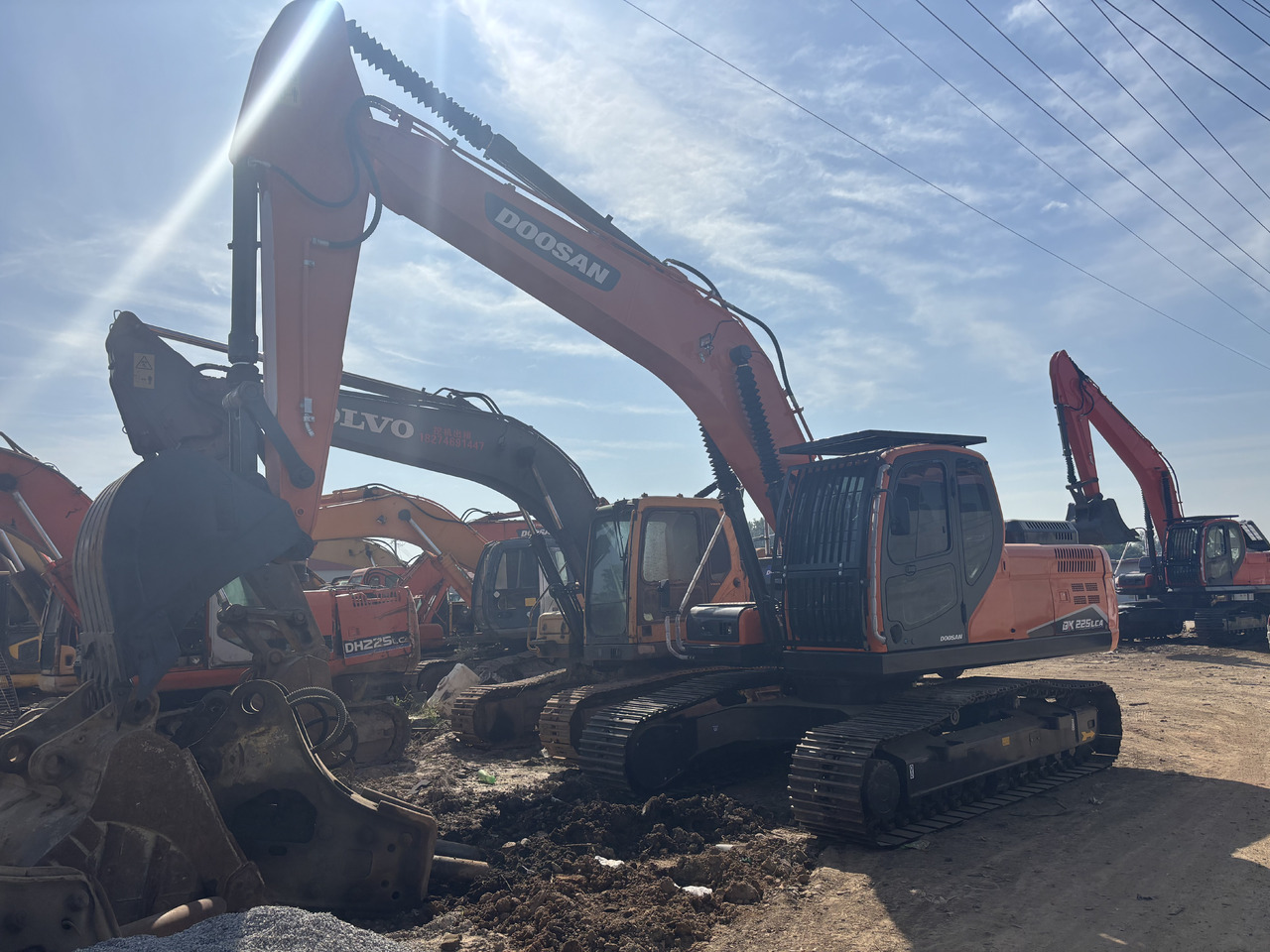 DOOSAN Korea imports doosan DX225 - Pelle sur chenille: photos 3 DOOSAN Korea imports doosan DX225 - Pelle sur chenille: photos 3