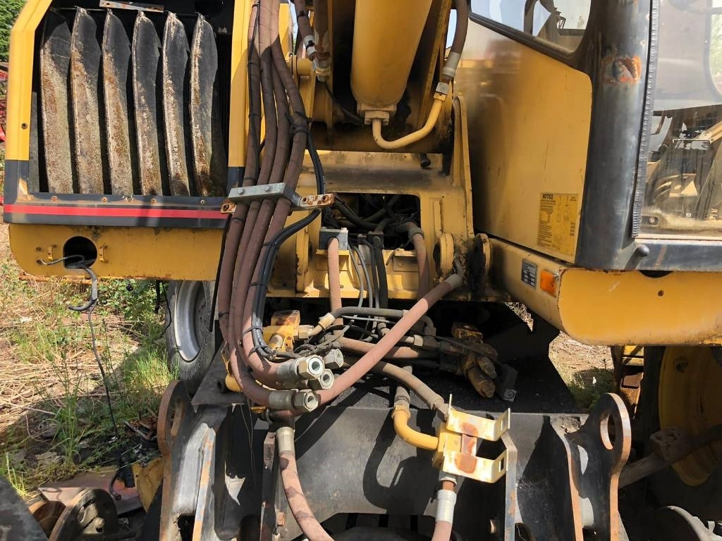 CAT M 312 FOR PARTS - Pelle sur pneus: photos 2 CAT M 312 FOR PARTS - Pelle sur pneus: photos 2